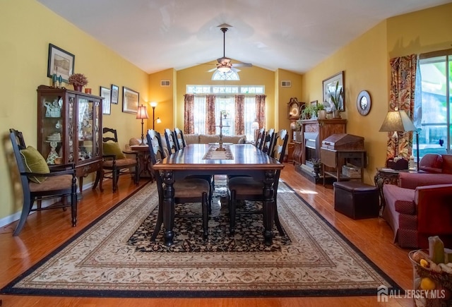 128 Fontaine Ct, Monroe, NJ 08831 - dining area with lofted ceiling, a ceiling fan, and wood finished floors