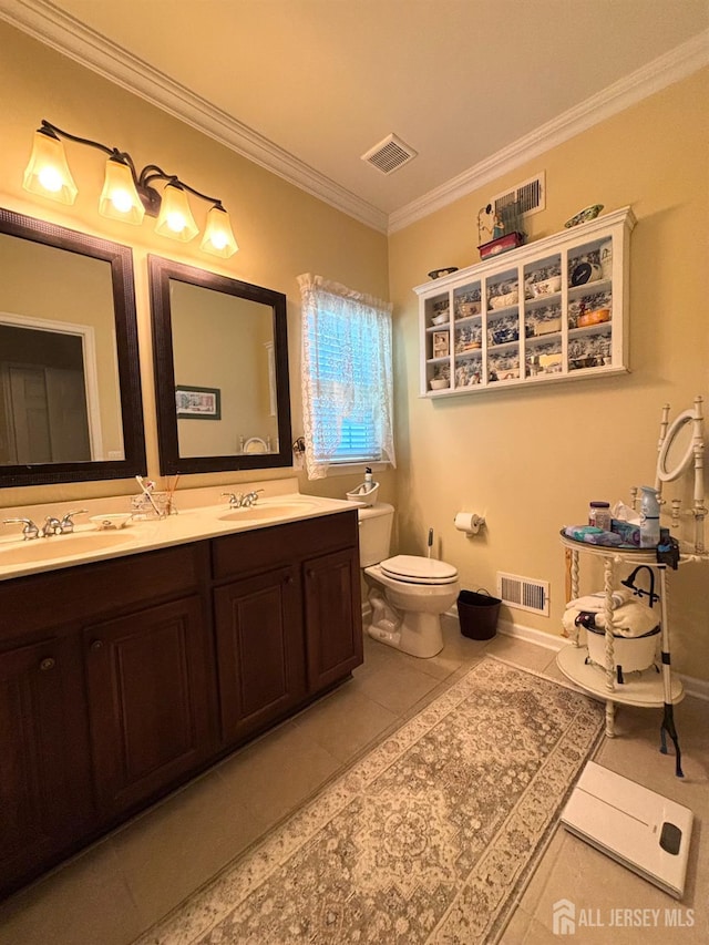 128 Fontaine Ct, Monroe, NJ 08831 - bathroom featuring double vanity, ornamental molding, toilet, and tile patterned flooring