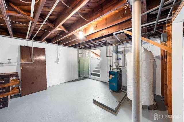 109 Russell St, Woodbridge Proper, NJ 07095 - unfinished basement featuring stairs, a heating unit, and water heater