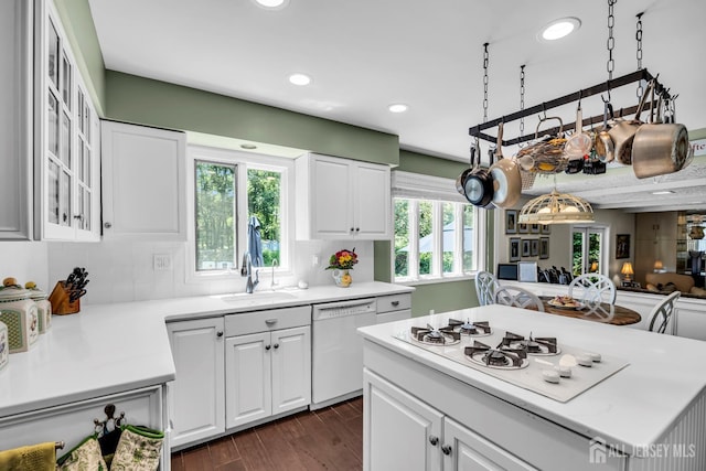 10 Margie Rd, East Brunswick, NJ 08816 - kitchen with white appliances, a sink, light countertops, backsplash, and recessed lighting