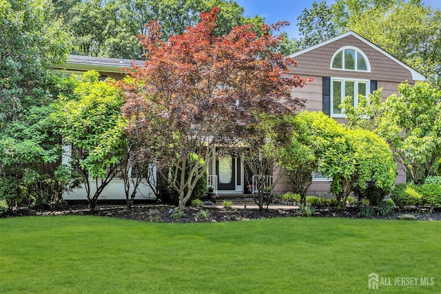 10 Margie Rd, East Brunswick, NJ 08816 - view of front of house featuring a front lawn