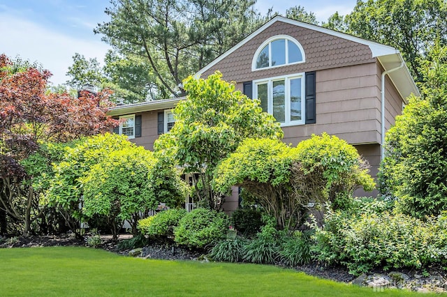 10 Margie Rd, East Brunswick, NJ 08816 - view of side of home with a lawn
