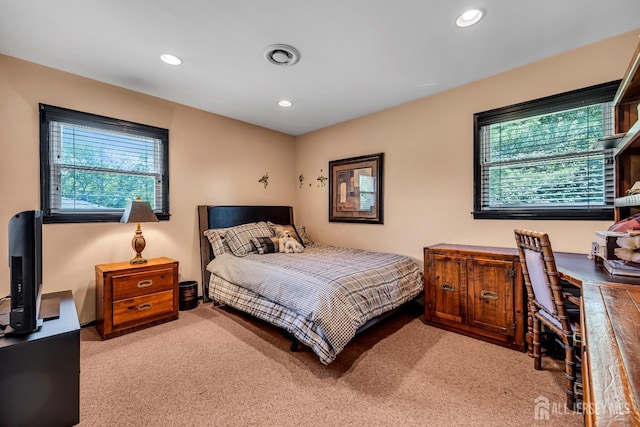 10 Margie Rd, East Brunswick, NJ 08816 - carpeted bedroom featuring multiple windows, recessed lighting, and a desk