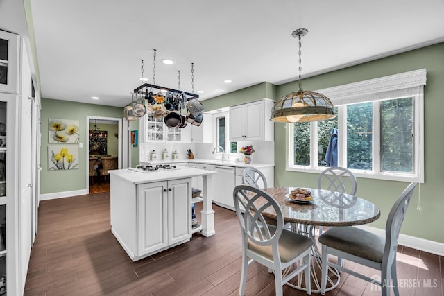 10 Margie Rd, East Brunswick, NJ 08816 - kitchen with baseboards, light countertops, white cabinets, healthy amount of natural light, and recessed lighting