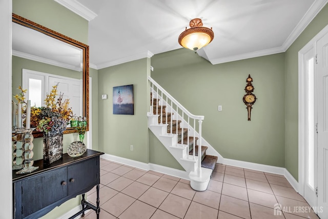 10 Margie Rd, East Brunswick, NJ 08816 - entryway with crown molding, stairs, light tile patterned floors, baseboards, and healthy amount of natural light