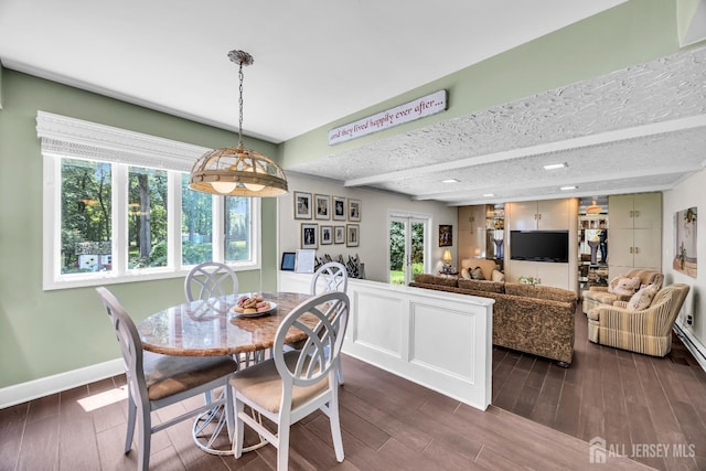 10 Margie Rd, East Brunswick, NJ 08816 - dining space featuring dark wood-type flooring and baseboards