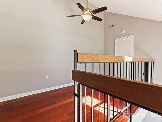 1010 Aspen Dr, Plainsboro, NJ 08536 - hall featuring wood finished floors, baseboards, and high vaulted ceiling