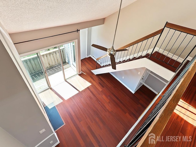 1010 Aspen Dr, Plainsboro, NJ 08536 - stairs with wood finished floors and a textured ceiling