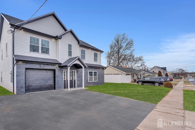 28 Kenmore Rd, Edison, NJ 08817 - traditional-style house featuring an attached garage and asphalt driveway
