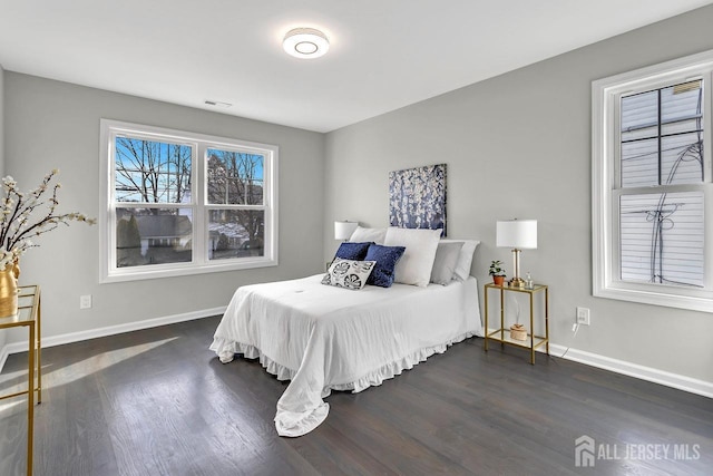 28 Kenmore Rd, Edison, NJ 08817 - bedroom featuring dark wood-type flooring and baseboards