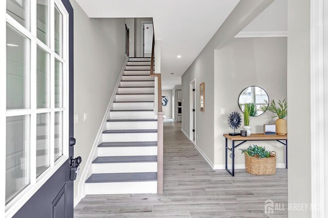 28 Kenmore Rd, Edison, NJ 08817 - foyer entrance with stairs, light wood-type flooring, and recessed lighting