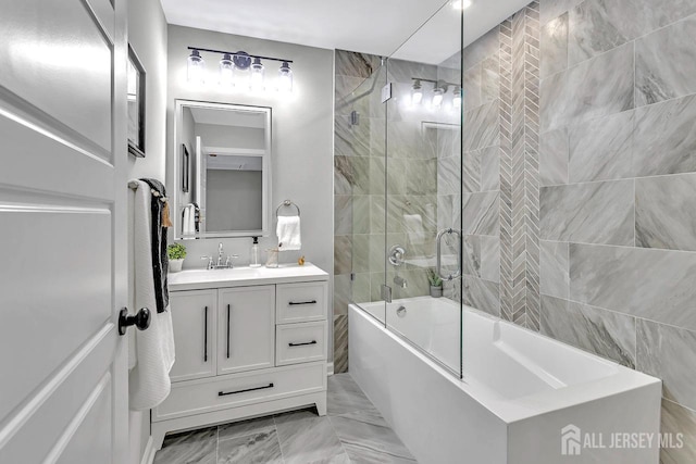 28 Kenmore Rd, Edison, NJ 08817 - full bathroom with vanity, washtub / shower combination, and marble finish floors