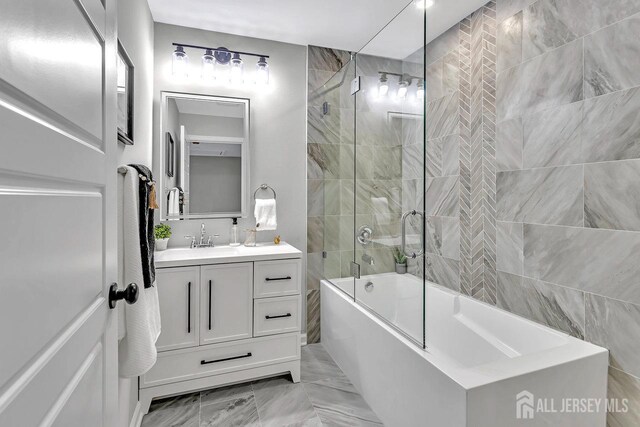 28 Kenmore Rd, Edison, NJ 08817 - full bath with vanity, shower / tub combination, and marble finish flooring