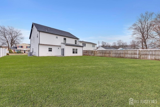 28 Kenmore Rd, Edison, NJ 08817 - back of property featuring central AC and roof with shingles