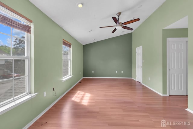 20 Sassafras Ct, North Brunswick, NJ 08902 - unfurnished room with a ceiling fan, light wood-type flooring, baseboards, and high vaulted ceiling
