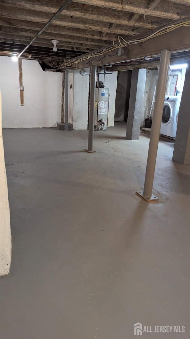 53 Suydam St, New Brunswick, NJ 08901 - unfinished basement with washer / dryer and water heater