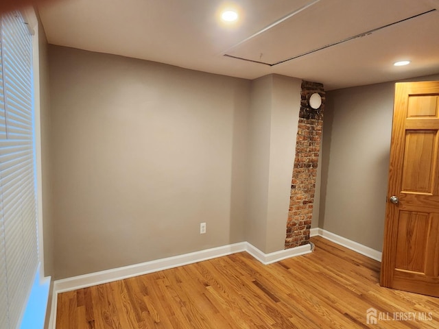 53 Suydam St, New Brunswick, NJ 08901 - empty room with light wood-style flooring, attic access, baseboards, and recessed lighting
