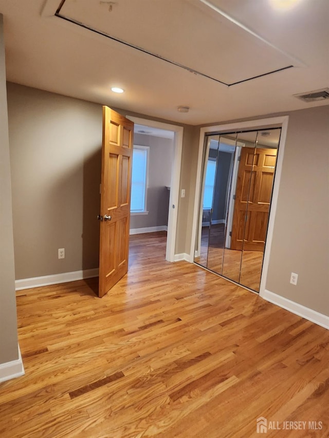 53 Suydam St, New Brunswick, NJ 08901 - empty room with light wood-style flooring, baseboards, and recessed lighting