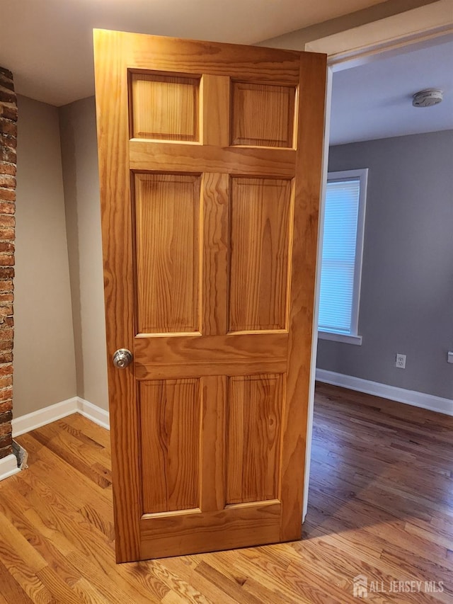 53 Suydam St, New Brunswick, NJ 08901 - detailed view of wood finished floors and baseboards