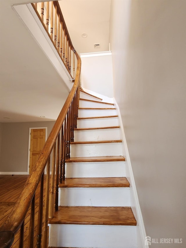 53 Suydam St, New Brunswick, NJ 08901 - stairway with wood finished floors