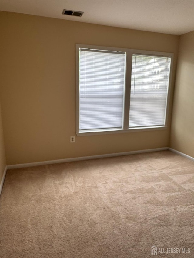 112 Biscayne Ct Unit 8, West Windsor, NJ 08540 - unfurnished room featuring baseboards and carpet