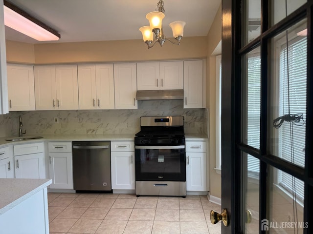 112 Biscayne Ct Unit 8, West Windsor, NJ 08540 - kitchen featuring appliances with stainless steel finishes, under cabinet range hood, healthy amount of natural light, and light countertops