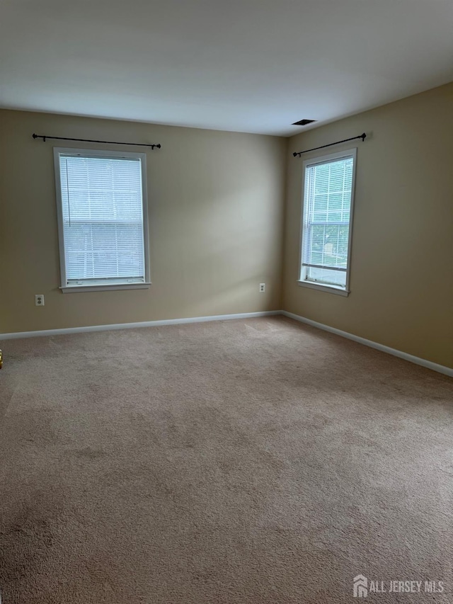 112 Biscayne Ct Unit 8, West Windsor, NJ 08540 - carpeted spare room with baseboards