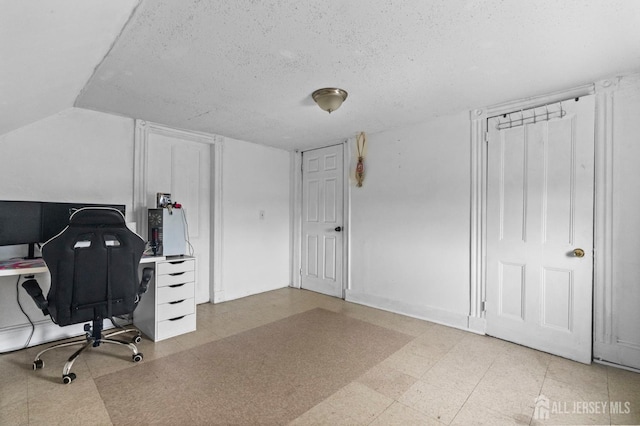 209 New St, New Brunswick, NJ 08901 - office space with a textured ceiling, tile patterned floors, and lofted ceiling