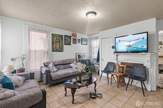 209 New St, New Brunswick, NJ 08901 - living room with plenty of natural light, light tile patterned floors, and a textured ceiling