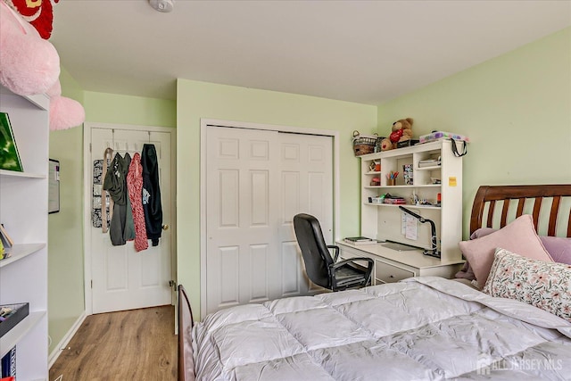 7 Cambridge Ct, East Brunswick, NJ 08816 - bedroom featuring wood finished floors and an office area
