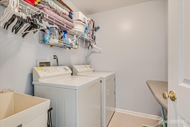7 Cambridge Ct, East Brunswick, NJ 08816 - laundry room with washer and clothes dryer and baseboards
