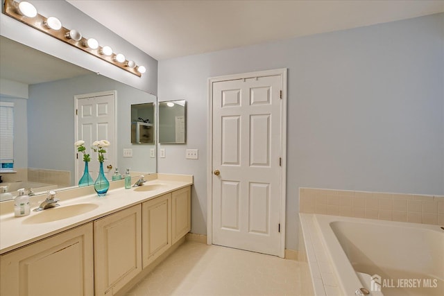7 Cambridge Ct, East Brunswick, NJ 08816 - full bath with double vanity, a bath, and tile patterned flooring