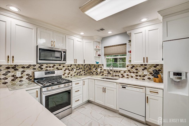 7 Cambridge Ct, East Brunswick, NJ 08816 - kitchen with appliances with stainless steel finishes, open shelves, light marble finish flooring, white cabinetry, and recessed lighting