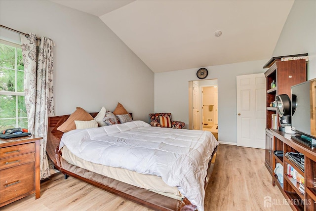 7 Cambridge Ct, East Brunswick, NJ 08816 - bedroom with vaulted ceiling, light wood-style floors, and ensuite bath