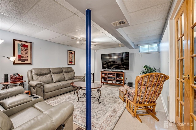7 Cambridge Ct, East Brunswick, NJ 08816 - living area featuring a paneled ceiling and baseboards