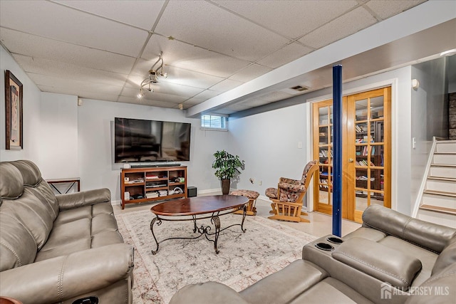 7 Cambridge Ct, East Brunswick, NJ 08816 - living area with a drop ceiling and stairway