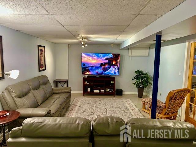 7 Cambridge Ct, East Brunswick, NJ 08816 - home theater room with a paneled ceiling and baseboards