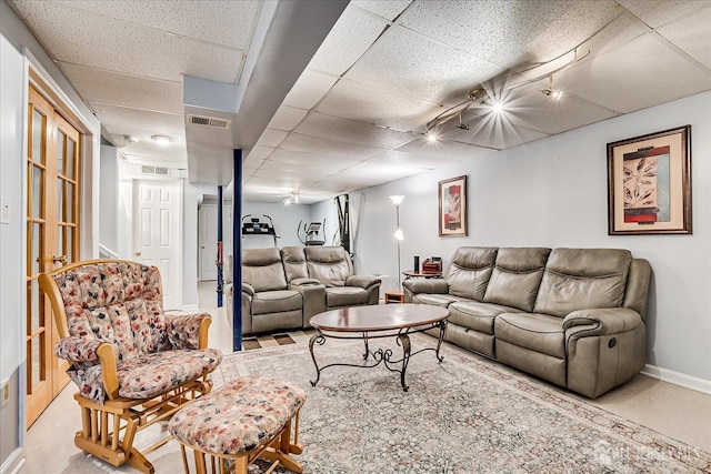 7 Cambridge Ct, East Brunswick, NJ 08816 - living room featuring a drop ceiling and baseboards