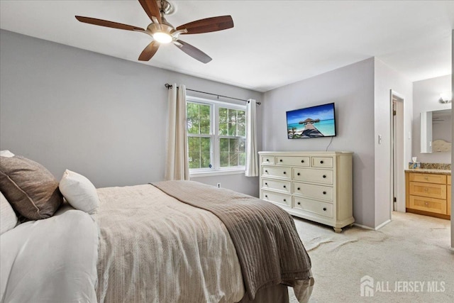 11 Excalibur Ct, Old Bridge, NJ 08857 - bedroom with light carpet, connected bathroom, and a ceiling fan