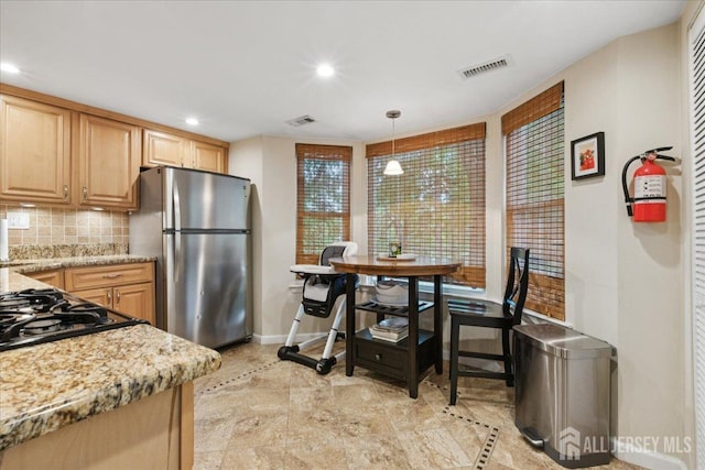 11 Excalibur Ct, Old Bridge, NJ 08857 - kitchen featuring freestanding refrigerator, light brown cabinets, recessed lighting, tasteful backsplash, and light stone countertops