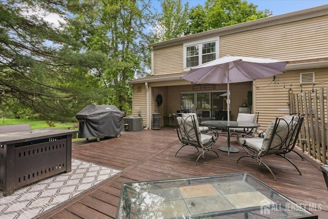 11 Excalibur Ct, Old Bridge, NJ 08857 - wooden deck with area for grilling and outdoor dining area