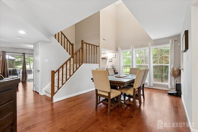 11 Excalibur Ct, Old Bridge, NJ 08857 - dining area featuring wood finished floors, stairway, high vaulted ceiling, and recessed lighting