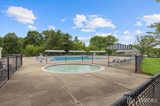 11 Excalibur Ct, Old Bridge, NJ 08857 - community pool with a patio area and a hot tub