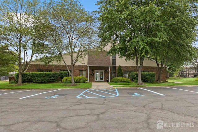 11 Excalibur Ct, Old Bridge, NJ 08857 - view of building exterior with uncovered parking