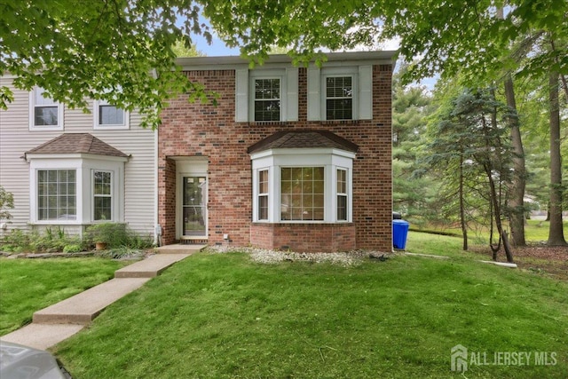 11 Excalibur Ct, Old Bridge, NJ 08857 - view of front of home featuring brick siding and a front yard