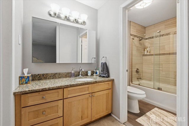 11 Excalibur Ct, Old Bridge, NJ 08857 - full bathroom featuring vanity, enclosed tub / shower combo, and wood finished floors