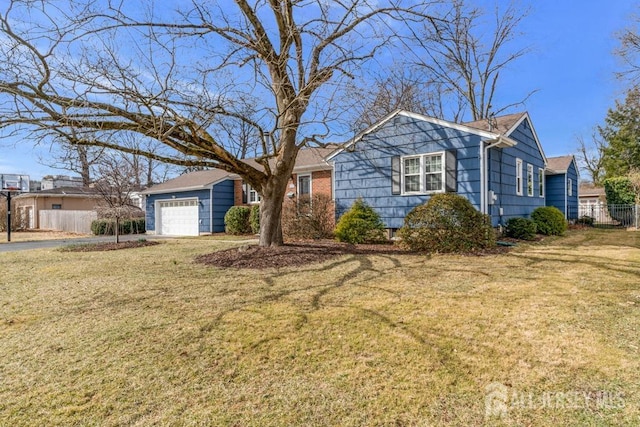 ranch-style house with a front lawn and fence