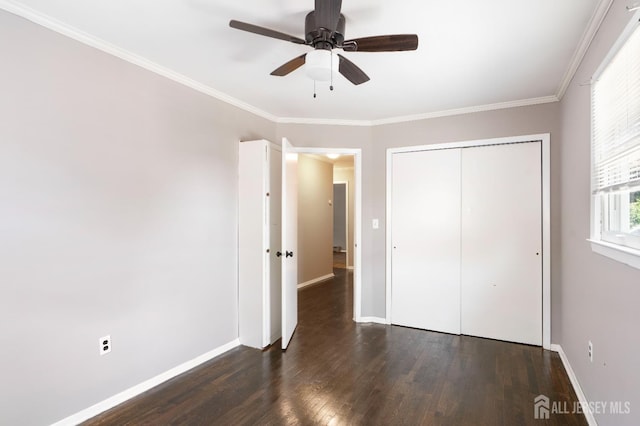 137 Safran Ave, Edison, NJ 08837 - unfurnished bedroom with dark wood-style floors, a closet, crown molding, and ceiling fan