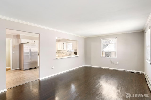 137 Safran Ave, Edison, NJ 08837 - unfurnished living room with wood finished floors, ornamental molding, healthy amount of natural light, a baseboard radiator, and cooling unit