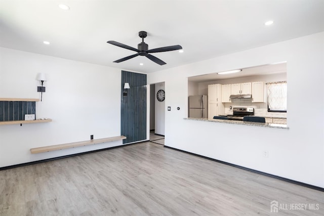137 Safran Ave, Edison, NJ 08837 - unfurnished living room with wood finished floors, ceiling fan, and recessed lighting